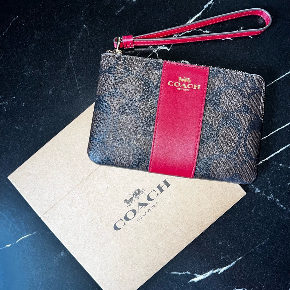 Coach Corner Zip Wristlet In Signature Canvas